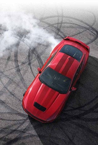 Overhead view of a 2024 Ford Mustang® model with tire tracks on pavement | Carriage Ford Inc in Clarksville IN