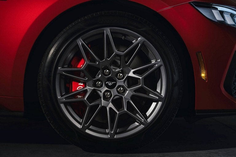 2024 Ford Mustang® model with a close-up of a wheel and brake caliper | Carriage Ford Inc in Clarksville IN